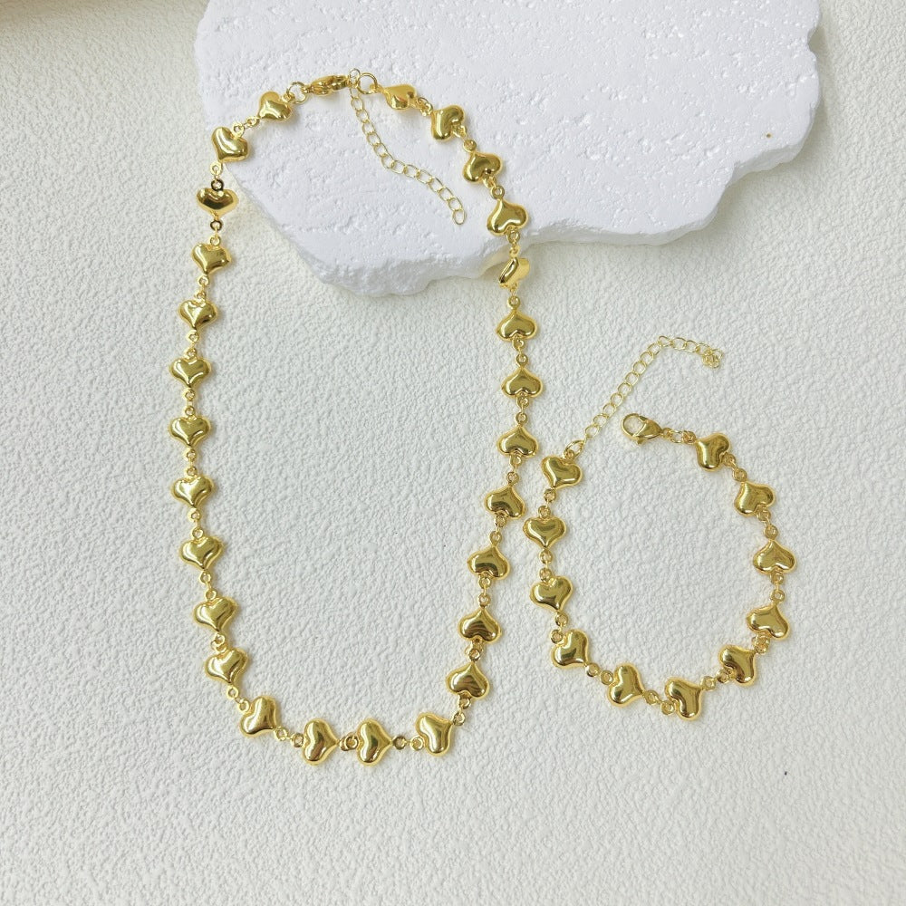 Wholesale Stainless Steel Three-dimensional Hollow Love Bracelet Necklace suit