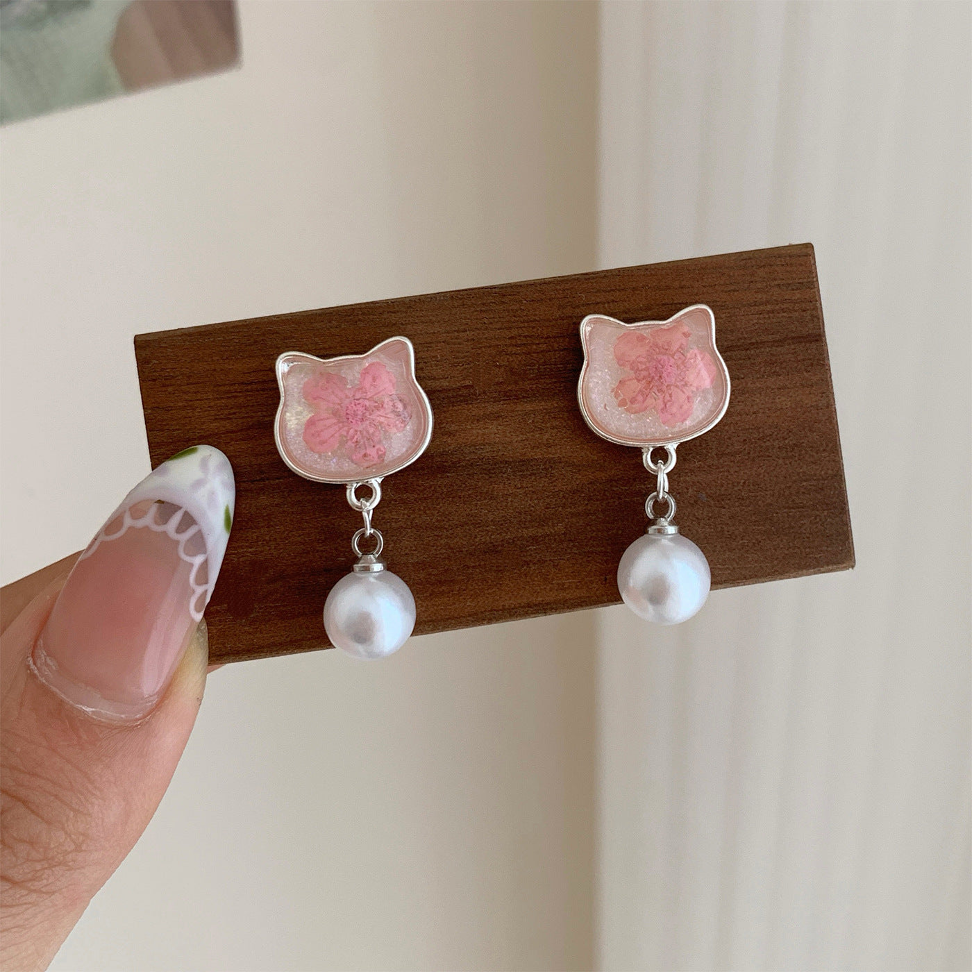 Wholesale Korean Style Pink Cherry Blossom Cat Earrings Alloy Electroplated Boutique Resale