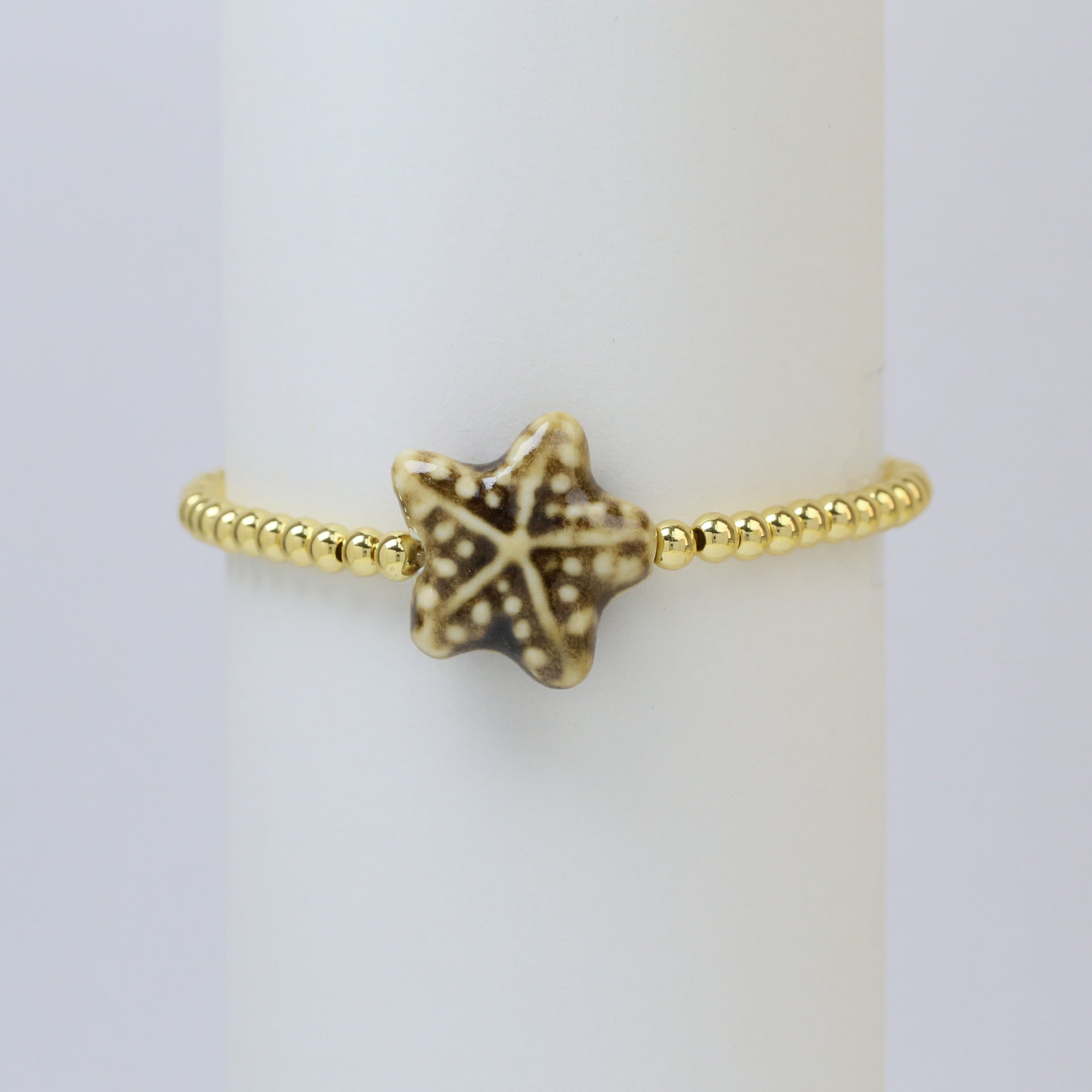 Wholesale Ceramic colored glass starfish elastic rope copper bead bracelet