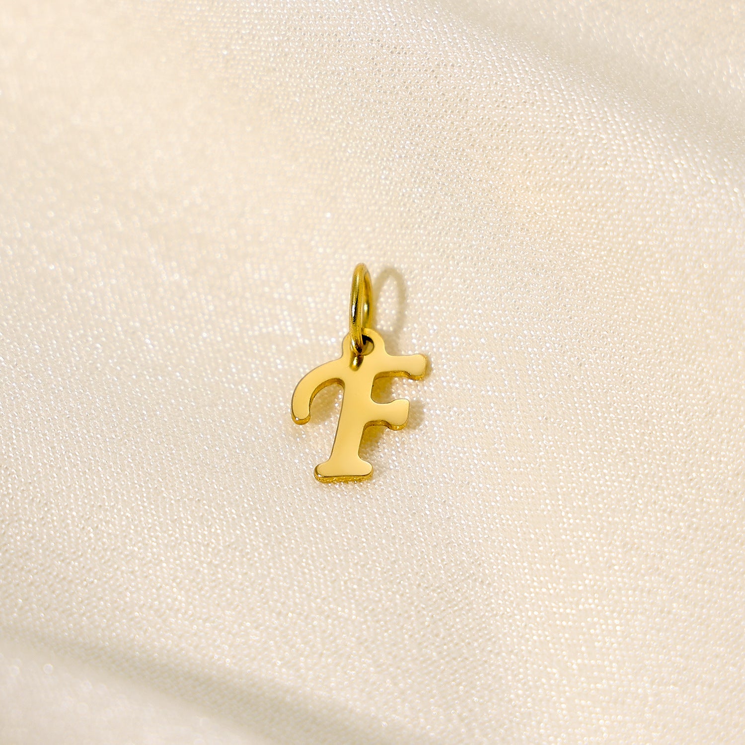 Wholesale 26 English letters stainless steel letter pendant