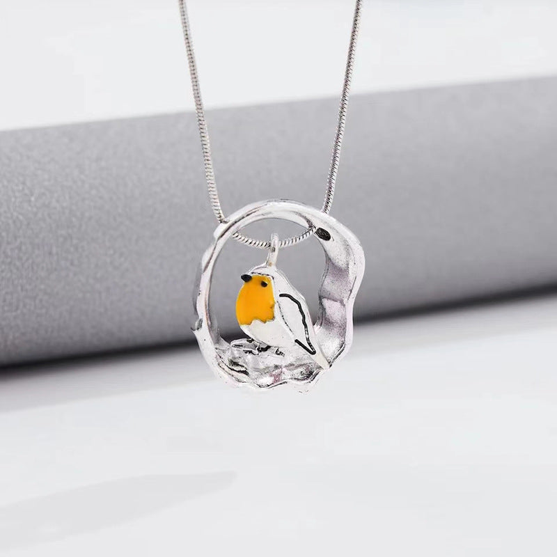 Wholesale Oval Hollow Oil Dropping Bird Necklace Creative Small Animal Pendant
