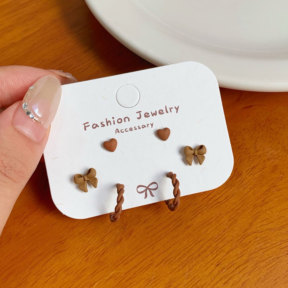 Wholesale Autumn cat geometric bean earrings set silver needle simple small flower bow earrings