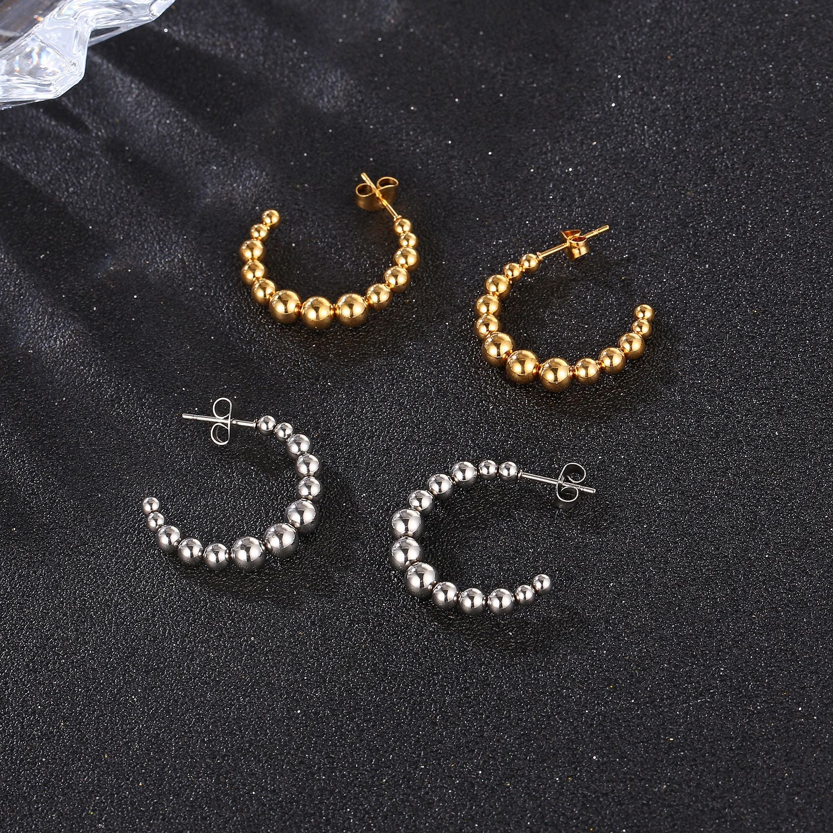 Boucles d'oreilles en gros en gros perles de soudage en forme de c
