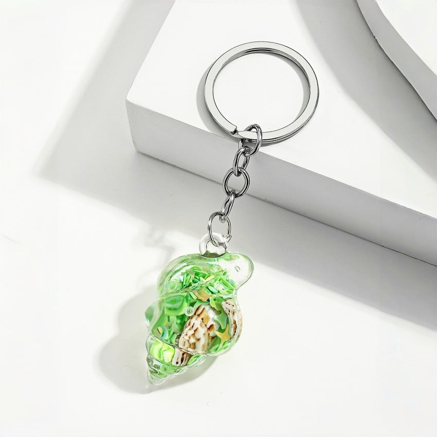 Wholesale Trendy Blue Acrylic Sea Shell Flowing Sand Keychain Charm Fashion Bag Decoration Creative Gift For Any Ocn