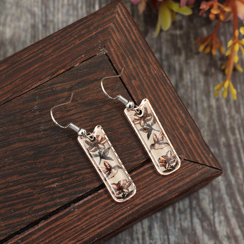 Wholesale Bohemian retro geometric glue flower alloy earrings