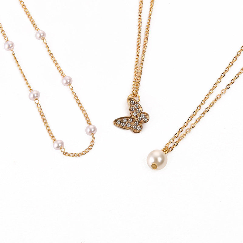 Wholesale Multi-layered pearl and diamond butterfly necklace