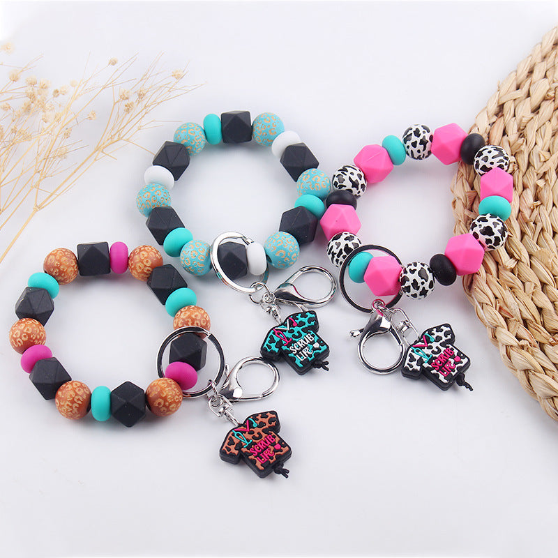 Wholesale Cartoon Nurse Uniform Silicone Beaded Wrist Keychain ACC-KC-GuangTian059