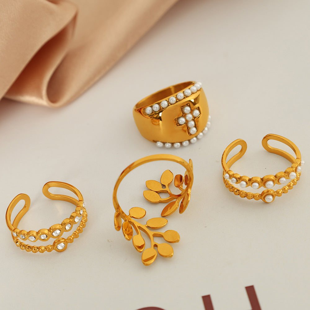 Wholesale high sense inlaid imitation pearl rhinestone ring retro titanium steel cross leaf ring jewelry