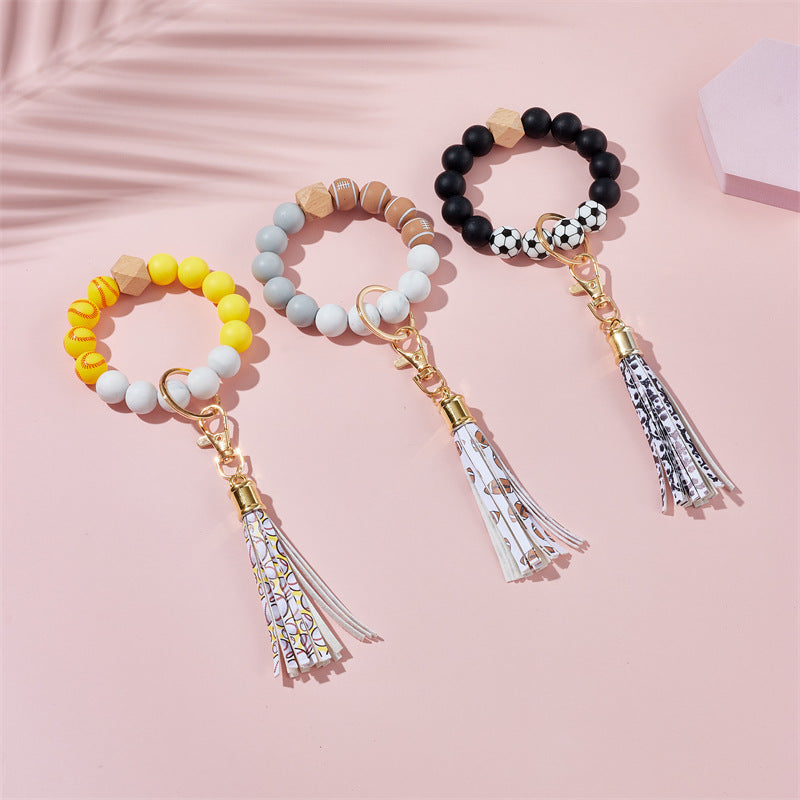 Wholesale Leopard Color Leather Tassel Keychain