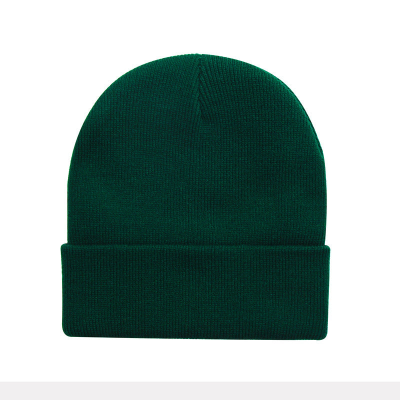 Wholesale Solid color knitted hat,  smooth plate cold hat curled brim Hat