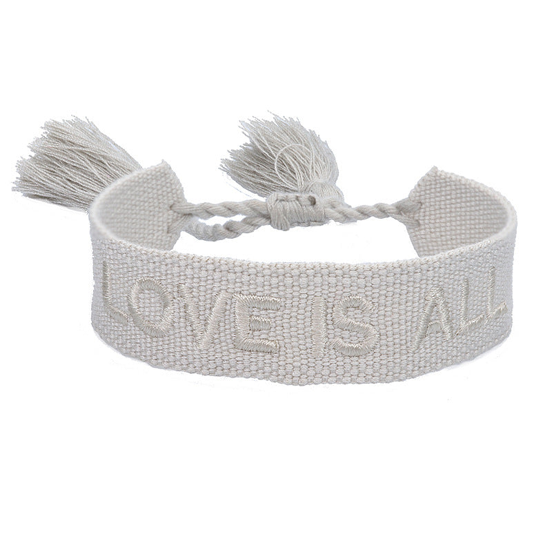 Wholesale Braided letter embroidered tassel bracelet