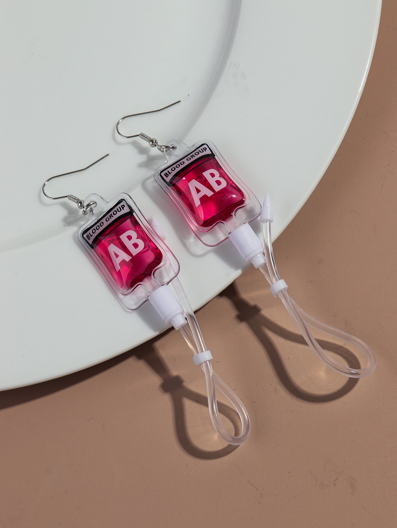Wholesale creative plasma blood bag earrings