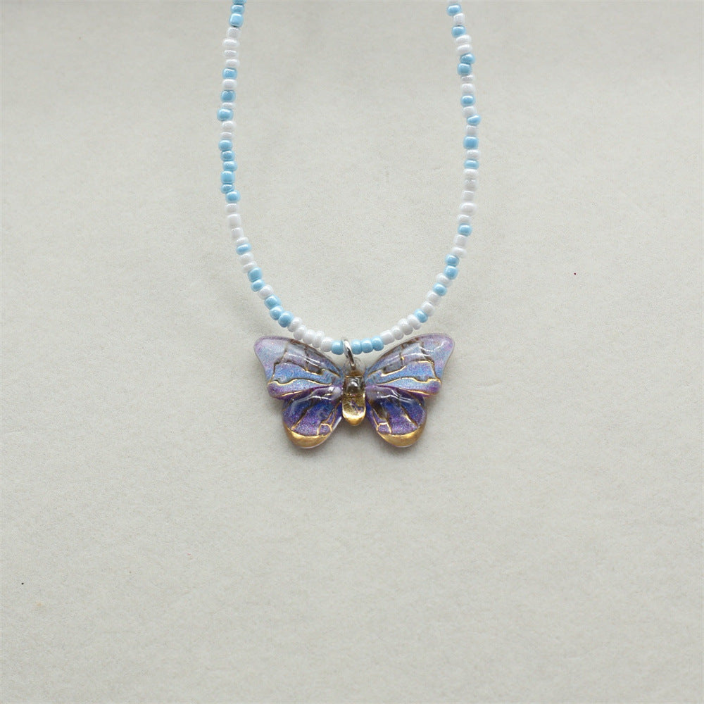 Wholesale gradient color bronzing butterfly sweet pendant rice beads beaded necklace