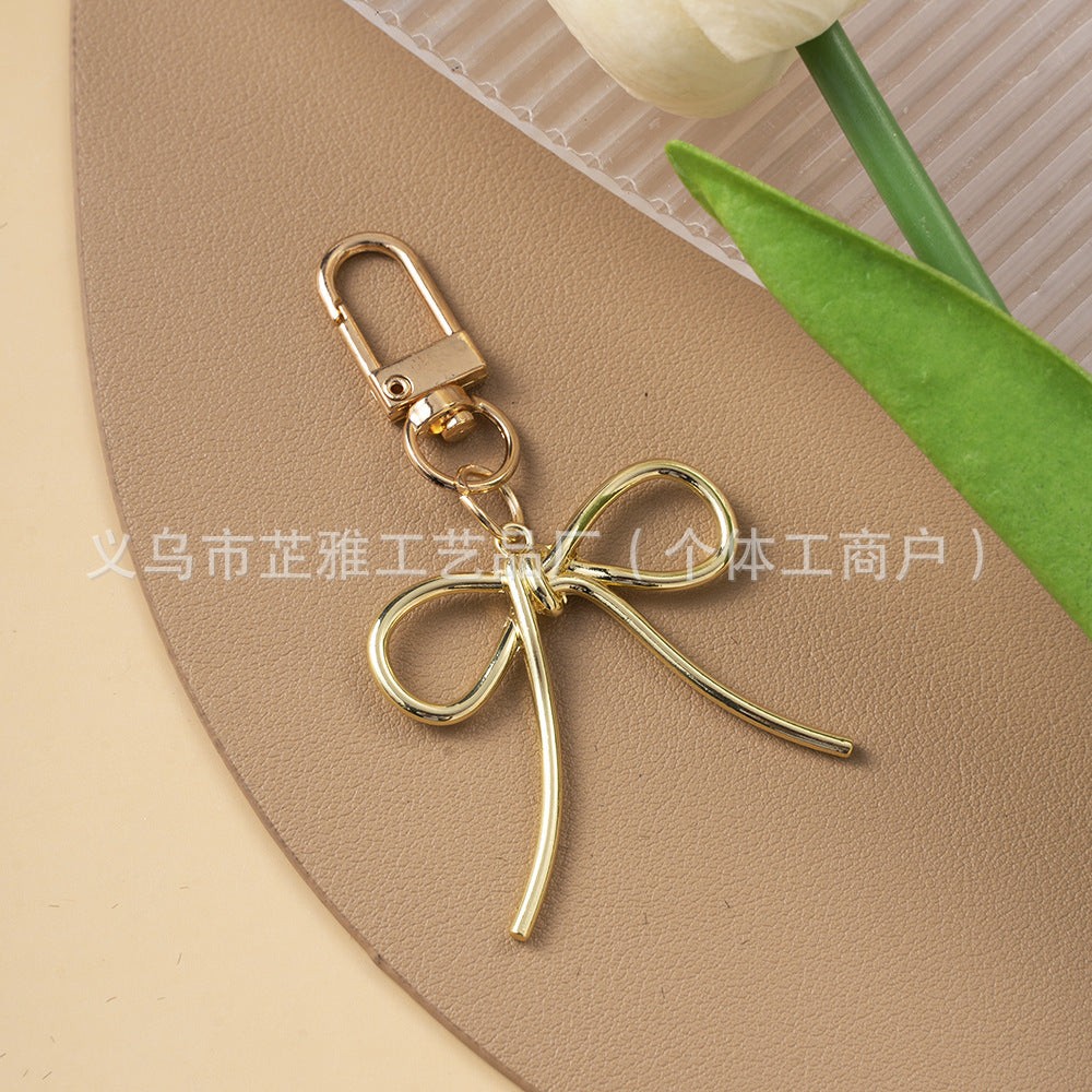 Wholesale Luxurious Resin Alloy Pearl Bow Keychains
