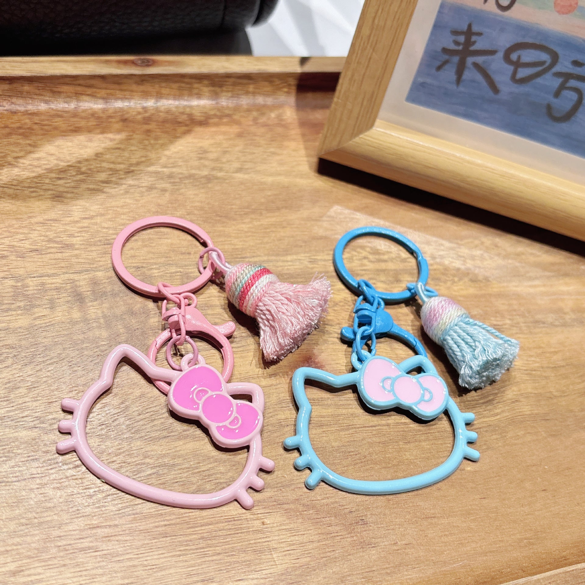 Wholesale hollow paint KT cat alloy key chain cute cartoon girl bag decoration