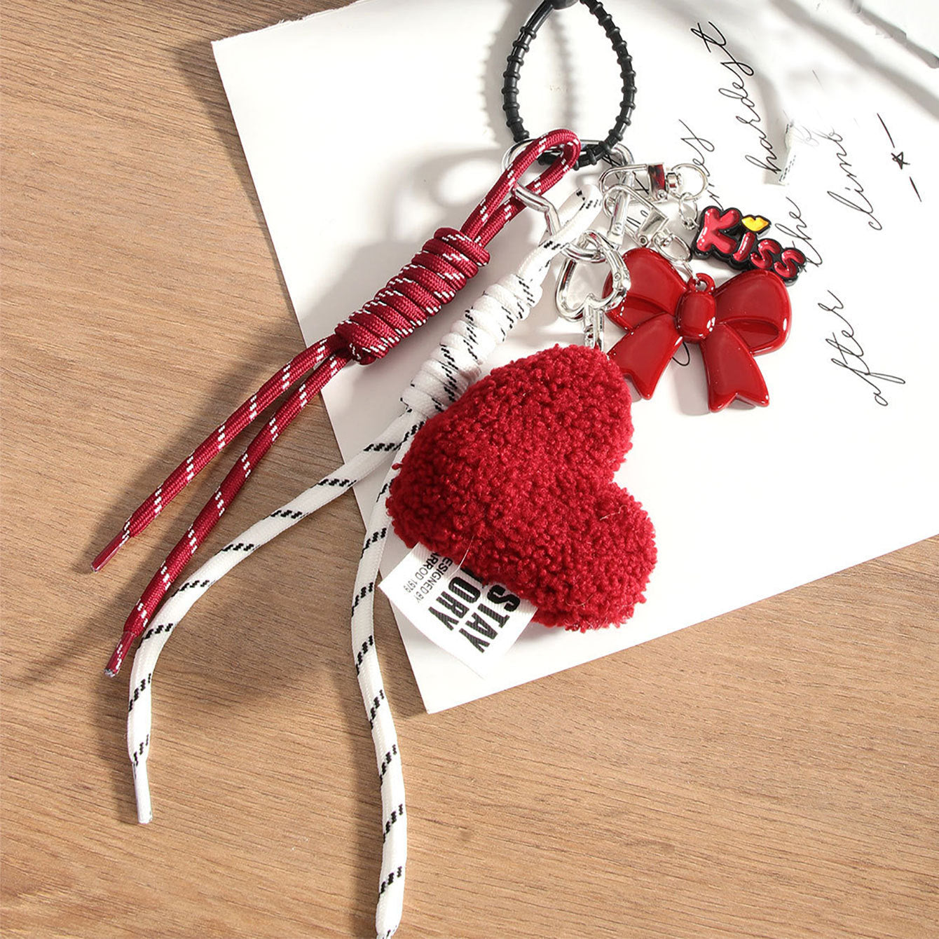 Wholesale Heart-shaped bowknot bag keychain made with woven cord