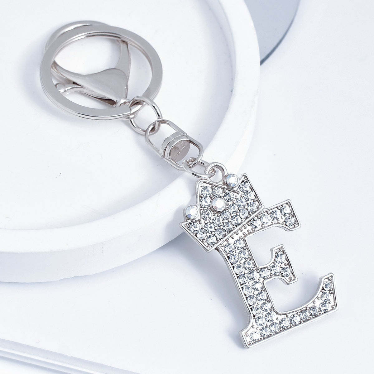 Wholesale Stylish Rhinestone 26 Letter Keychain Zinc Alloy Silver Metal Pendant Car Backpack Accessory Fashion Jewelry Gift For Resale