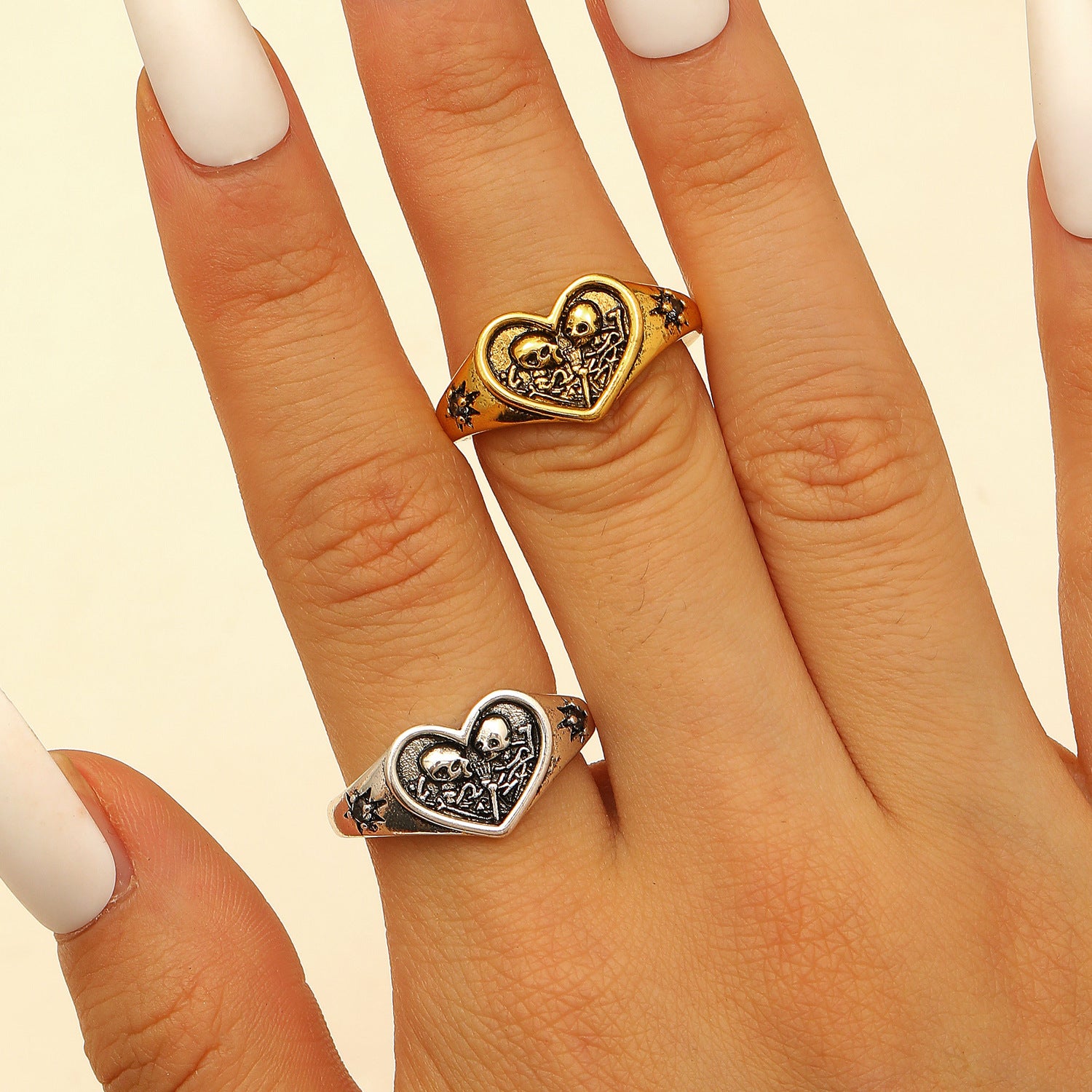 Wholesale heart double skull starburst open ring