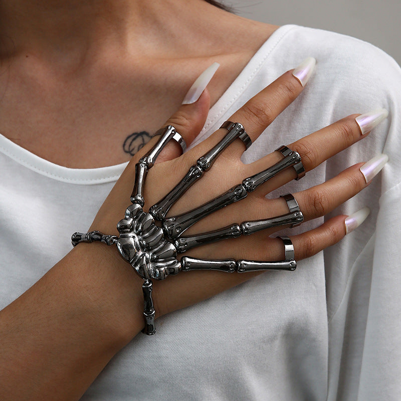 Wholesale punk style five finger ring exaggerated skull bracelet