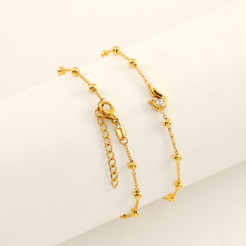 Wholesale Stainless steel bracelet with zircon flowers and a bowknot design