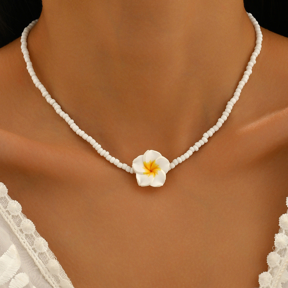 Wholesale Bohemian holiday style cute frangipani soft clay flower rice bead necklace