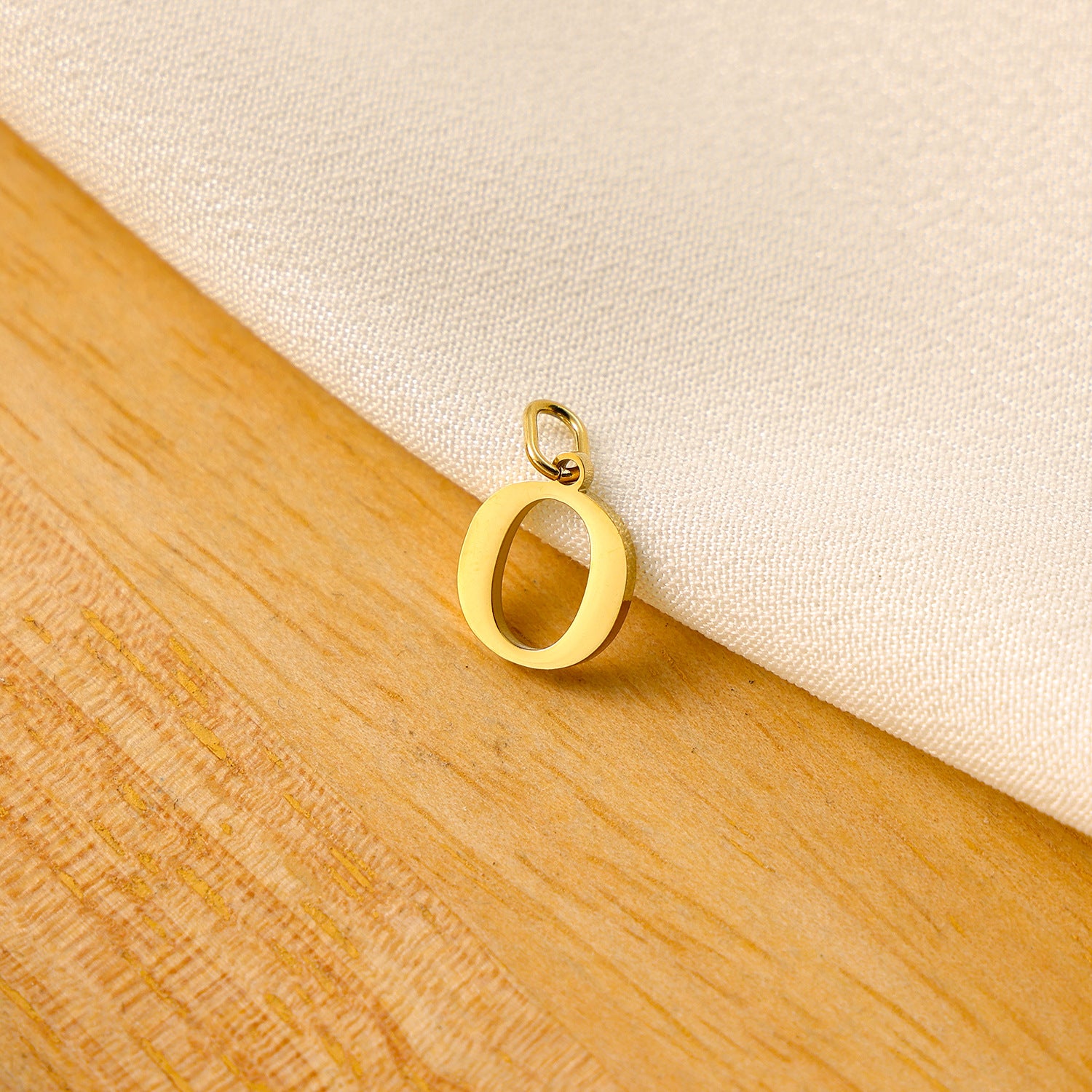 Wholesale Titanium steel letter pendant