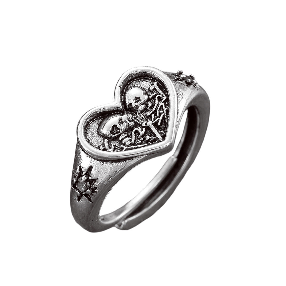 Wholesale heart double skull starburst open ring