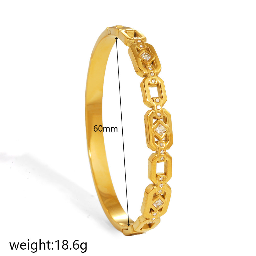 Wholesale Titanium Steel Geometric Starburst Bangle with Inlaid Diamonds