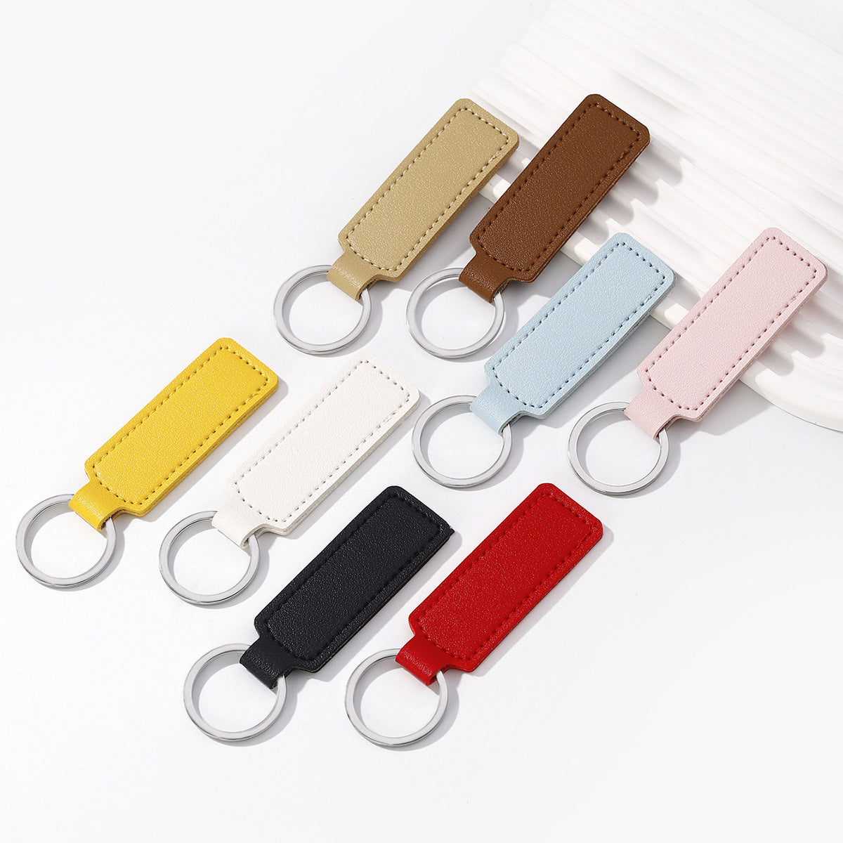 Wholesale solid color PU leather keychain