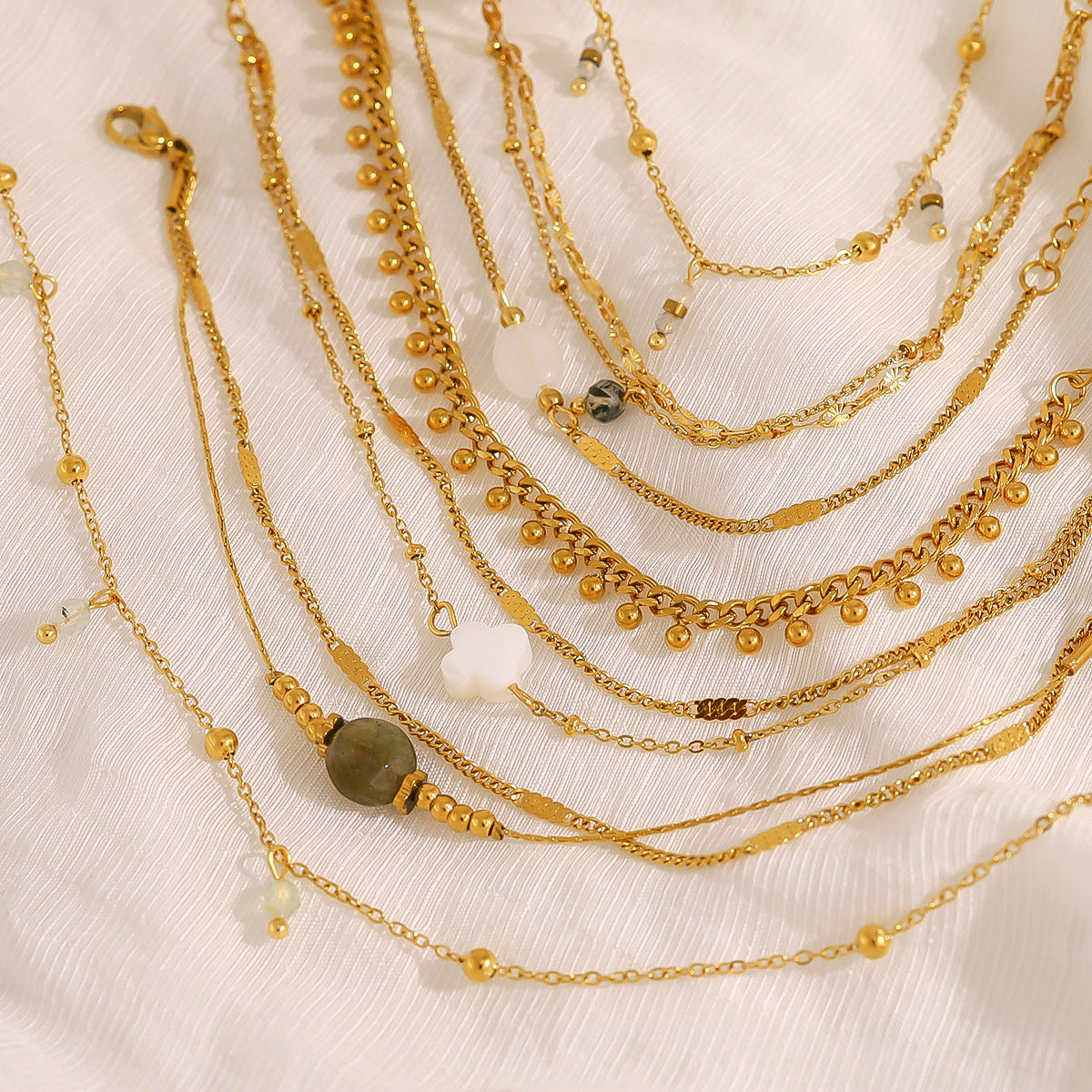 Wholesale Titanium Steel Stacked Bracelet suit Four-leaf Clover Natural Shell Pendant Bracelet suit