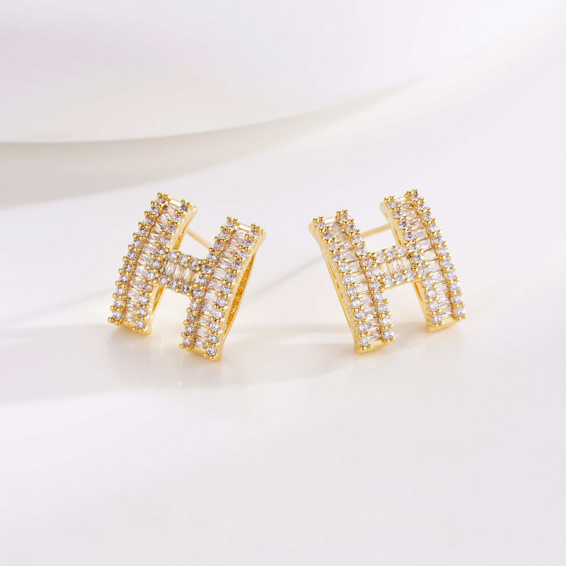Wholesale Copper Plated Real Gold Inlaid Zircon Silver Needle Earrings