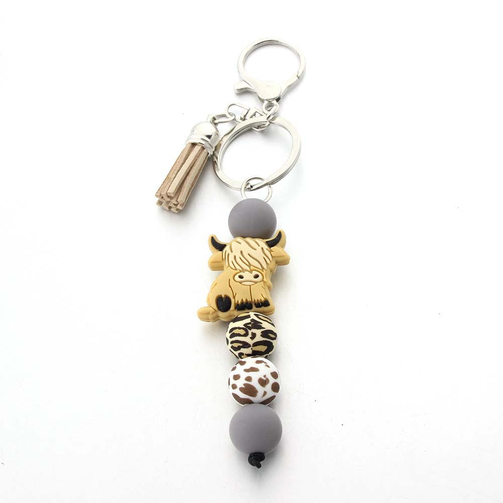 Wholesale Cartoon Cow Teeth Silicone Bead Keychain