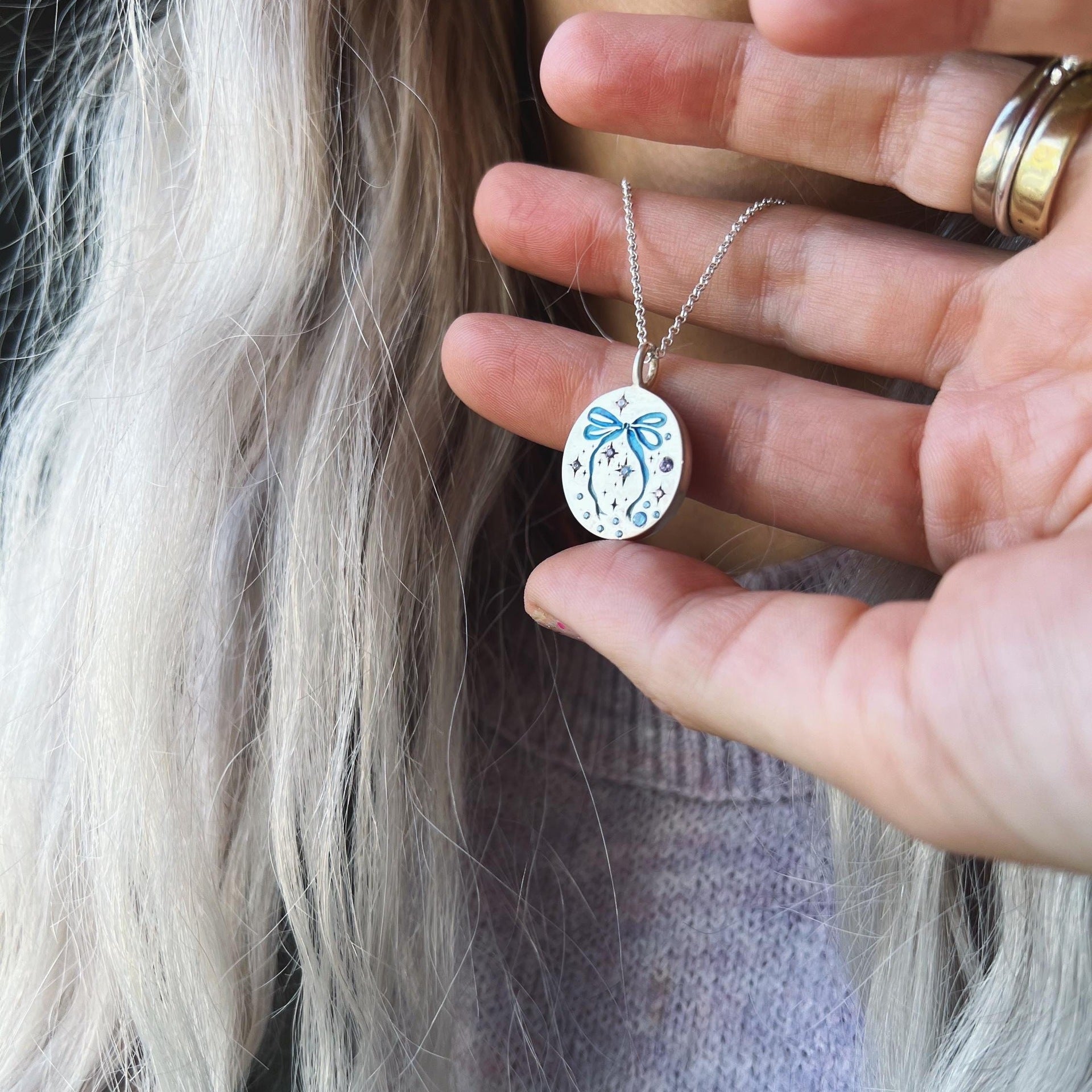 Wholesale Titanium Steel Bow Painted Oil Dropping Rabbit Element Pet Oval Tarot Necklace