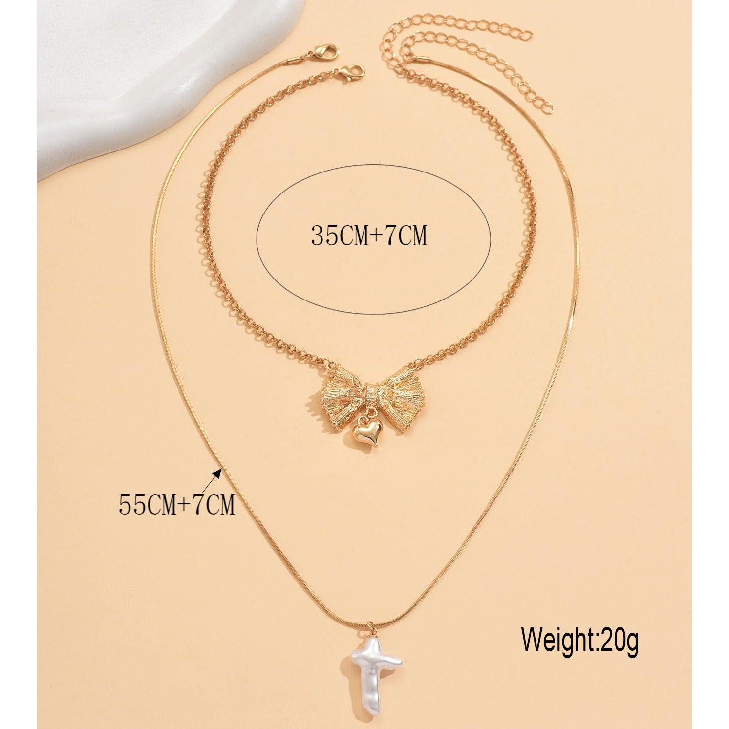 Wholesale European and American cross-border jewelry,  unique bow heart-shaped pearl pendant necklace,  simple round snake chain clavicle chain for women.