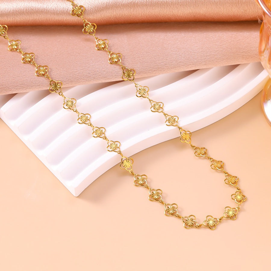 Wholesale Openwork floral four-leaf clover bracelet and necklace