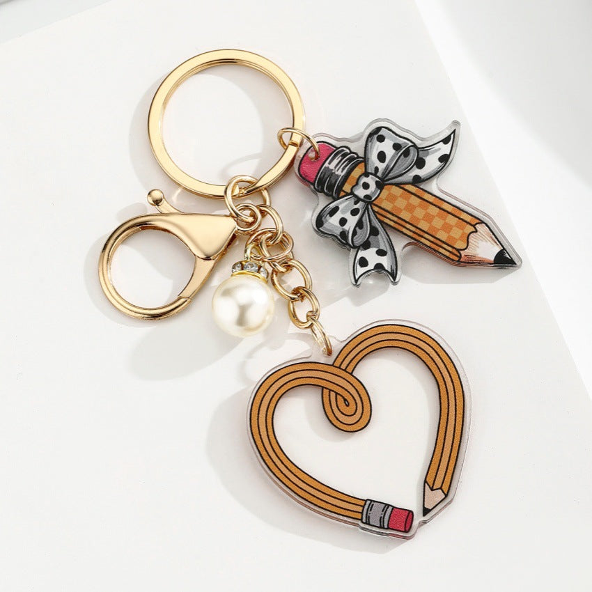 Portachiavi a matita con slogan e lettera di perle di libro acrilico all'ingrosso