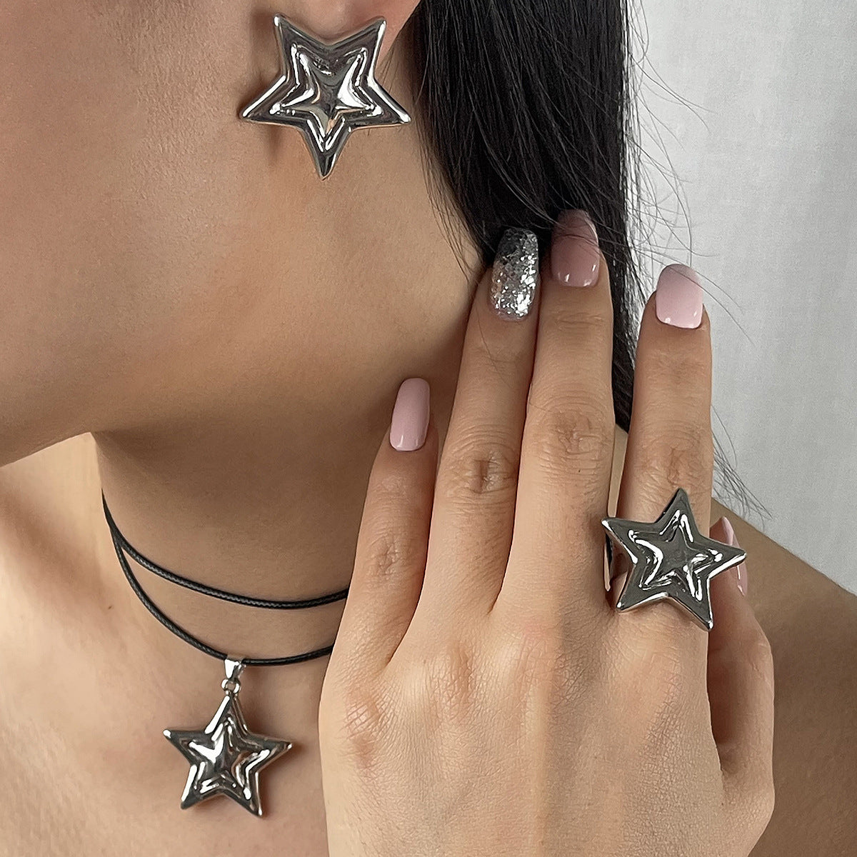 Nicchia creativa all'ingrosso dell'anello della collana degli orecchini della doppia stella a cinque punte all'ingrosso