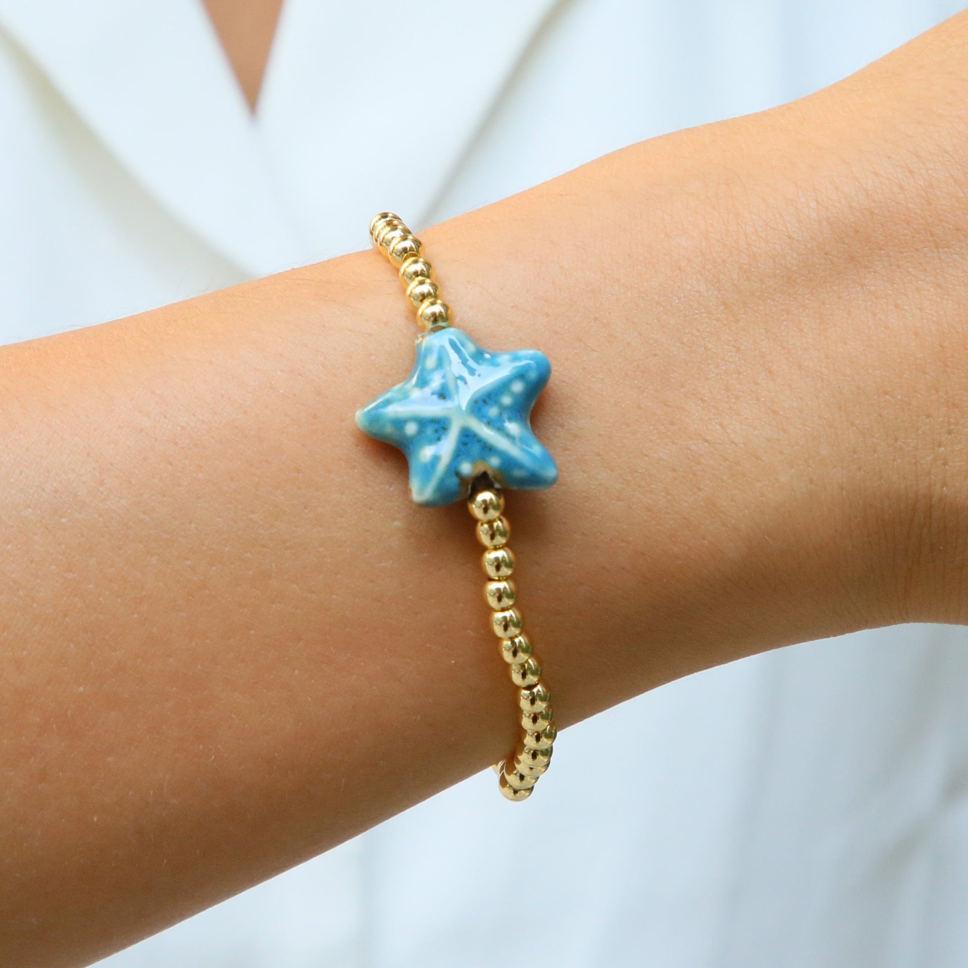 Wholesale Ceramic colored glass starfish elastic rope copper bead bracelet