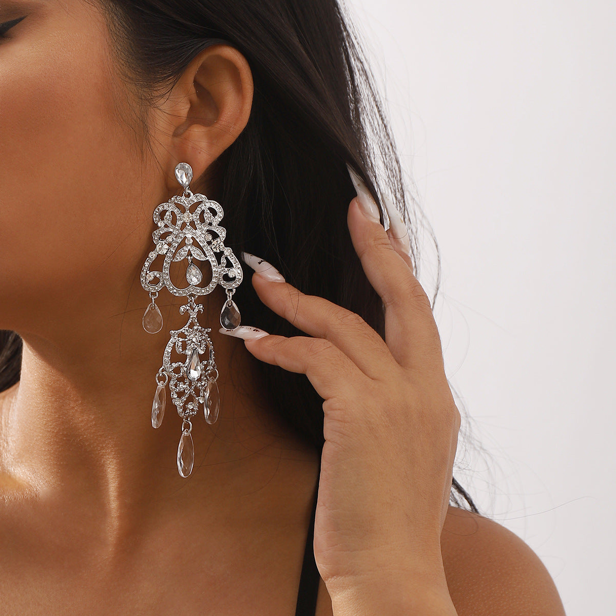 Wholesale hollow drop-shaped tassel earrings