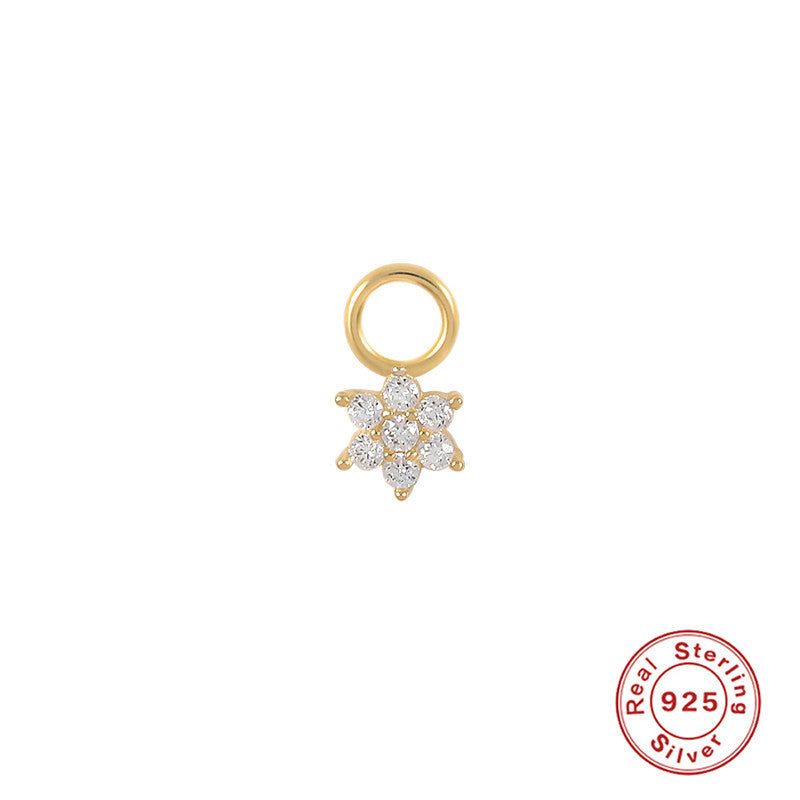 Gold-tone flower-shaped crystal charm with a Real Sterling Silver 925 graphic