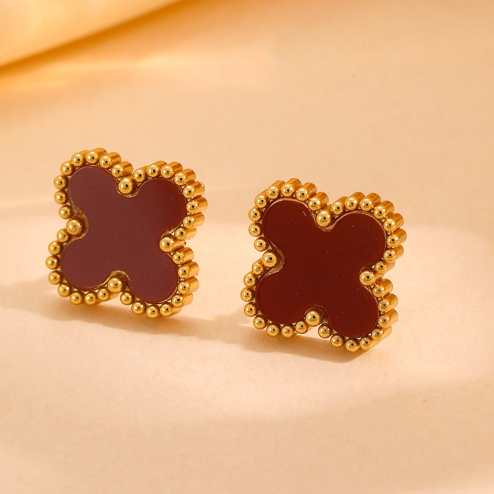 Wholesale Fashion stainless steel three four-leaf flower jewelry new titanium steel does not fade small flower jewelry suit