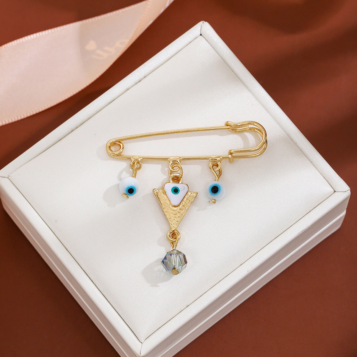 Wholesale Diamond-encrusted Devil' s Eye Tassel Brooch