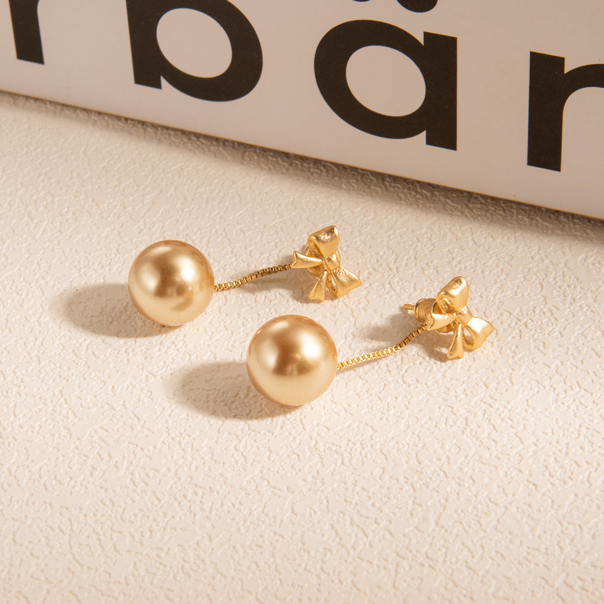 Wholesale Champagne Pearl Bow Earrings
