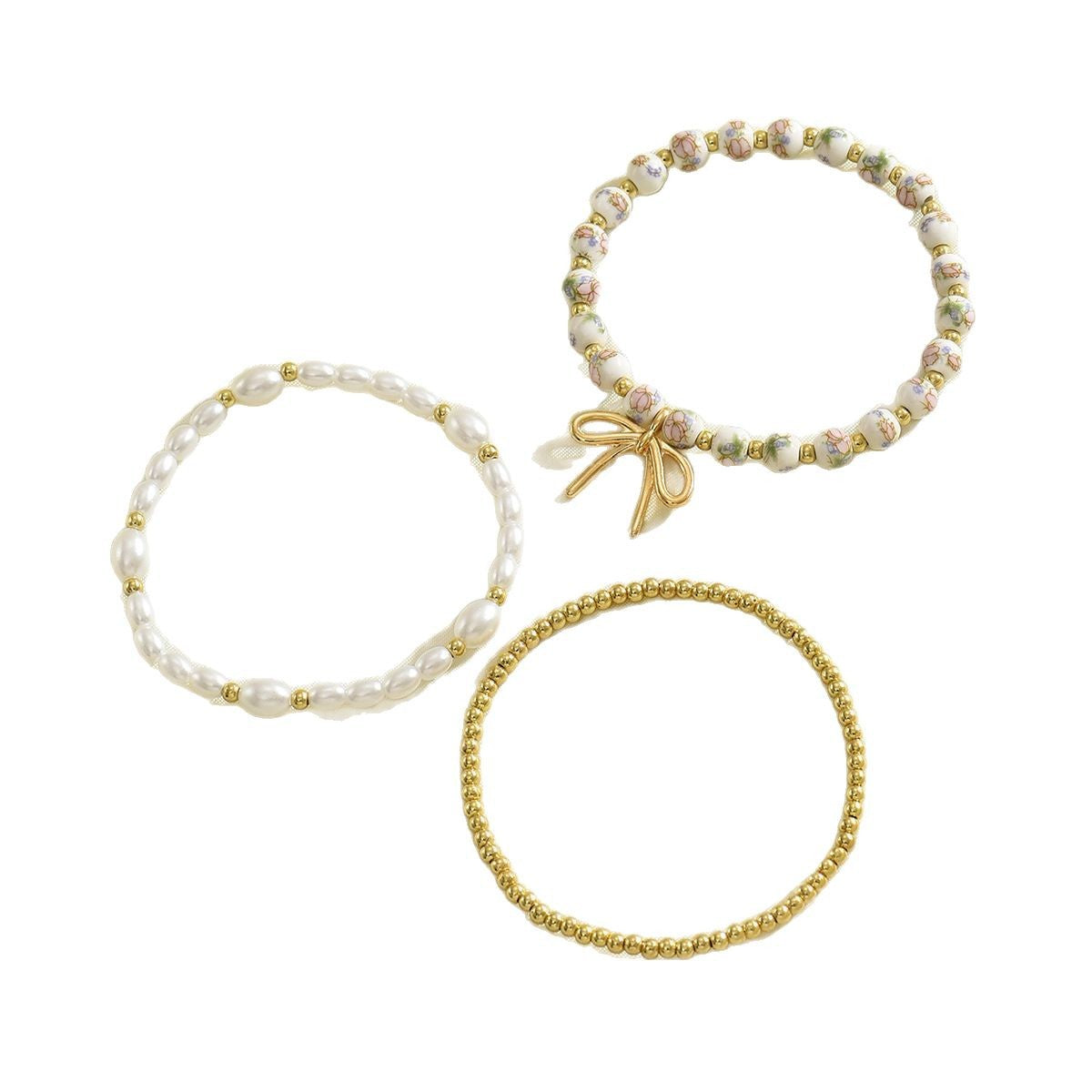 Wholesale Ceramic vintage-style printed bracelet and beaded bracelet set with pearl and butterfly knot pendants