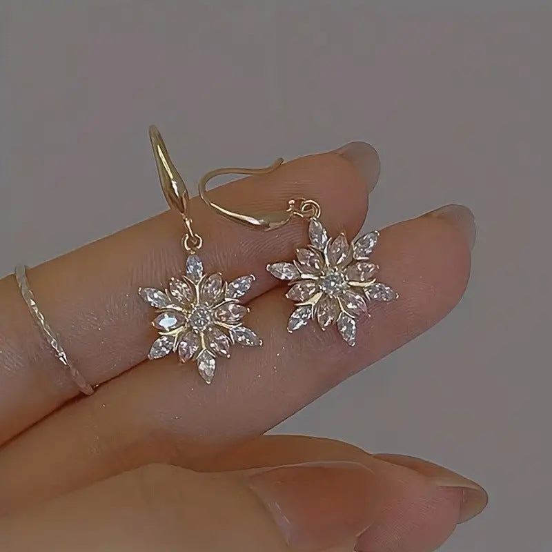 Wholesale Winter snowflake pollen white zircon earrings