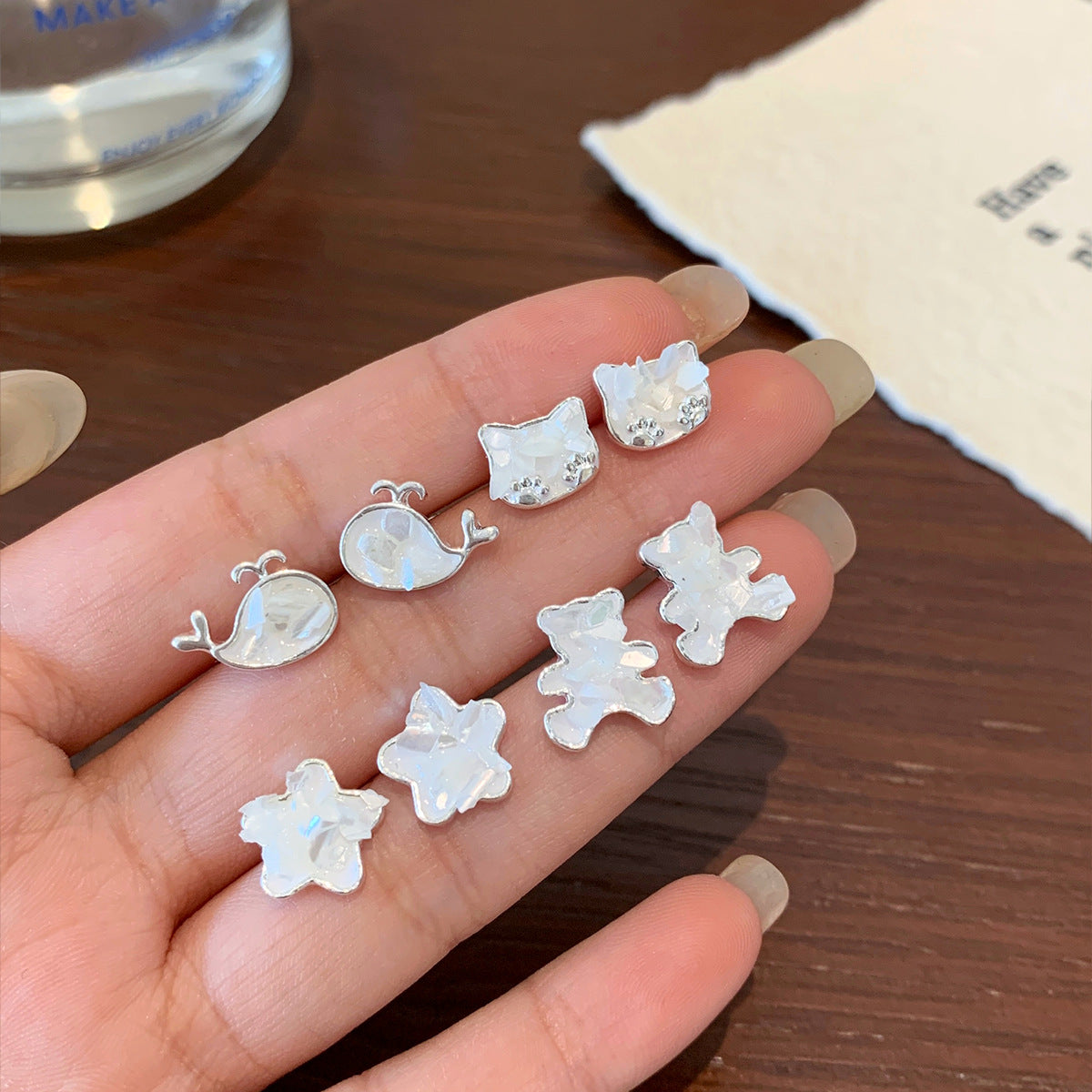 Wholesale Broken shells cat starfish earrings set silver needle heart bow earrings