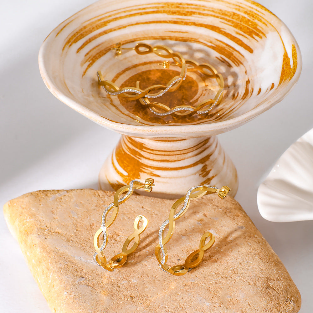 Großhandelskreis C-formed Twist geflochtener Haken verpackter Zirkon glänzender Edelstahlohrringe