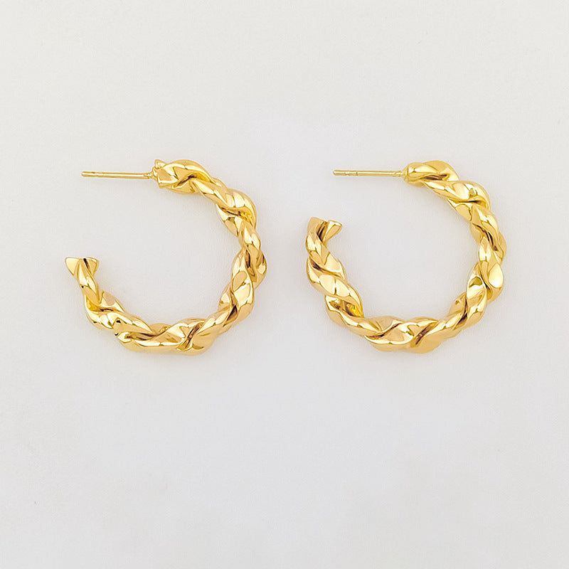 Wholesale twist earrings plain ring light luxury copper plated gold earrings