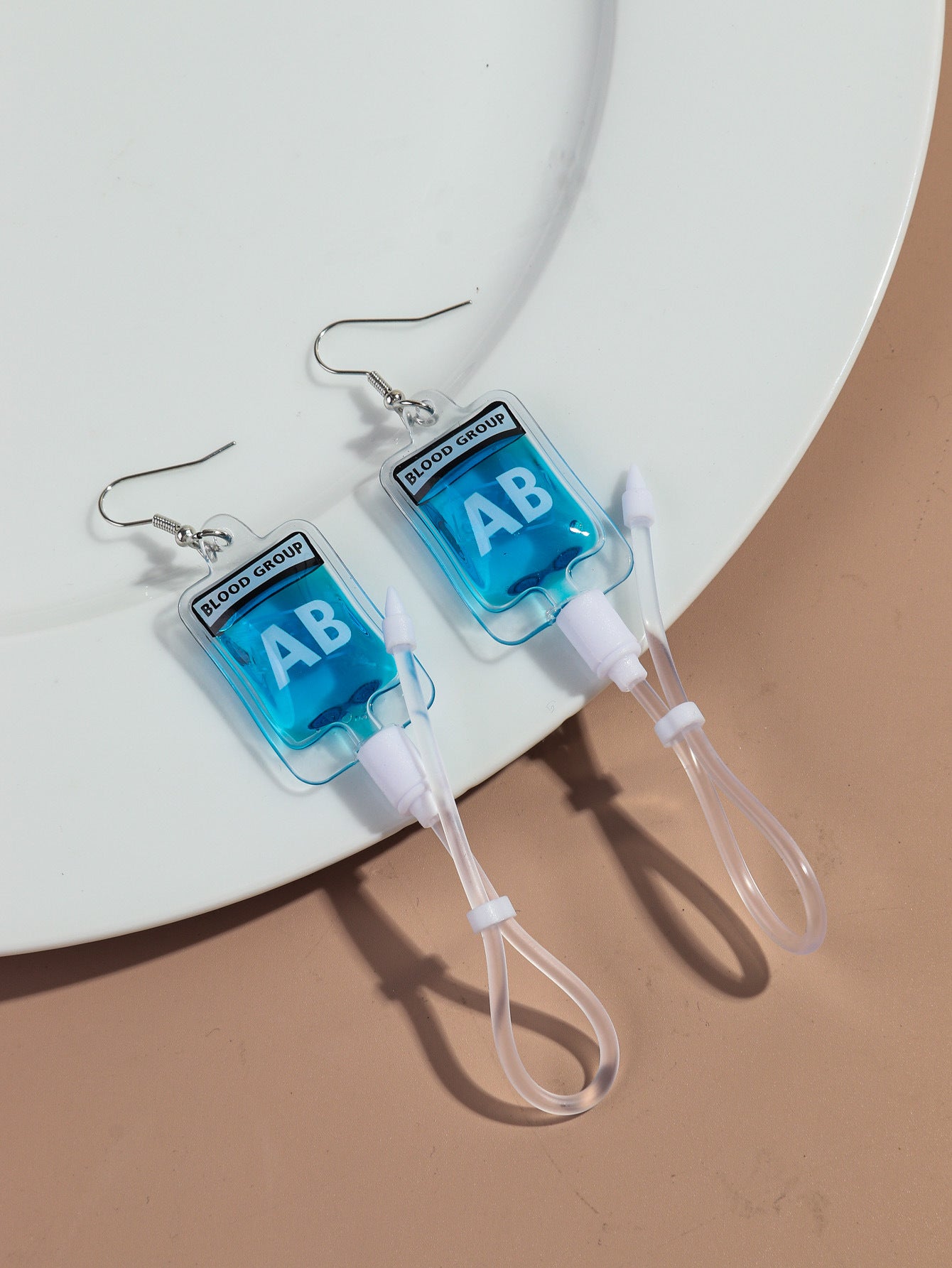 Wholesale creative plasma blood bag earrings