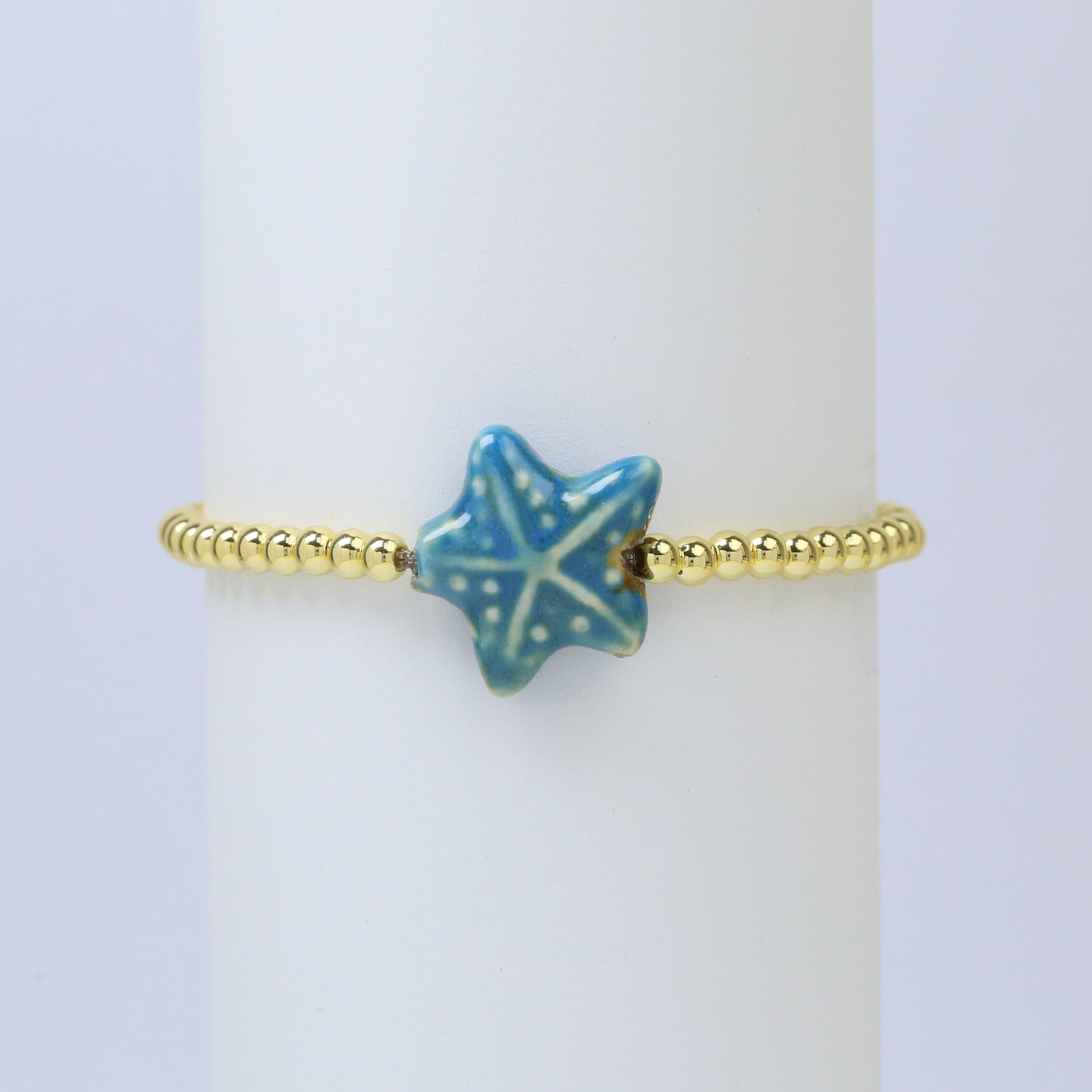 Wholesale Ceramic colored glass starfish elastic rope copper bead bracelet